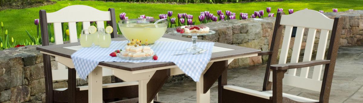 Back patio Garden seating with a table and chairs with lemonade.