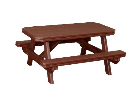 Child-sized table Child sized picnic table with benches attached.