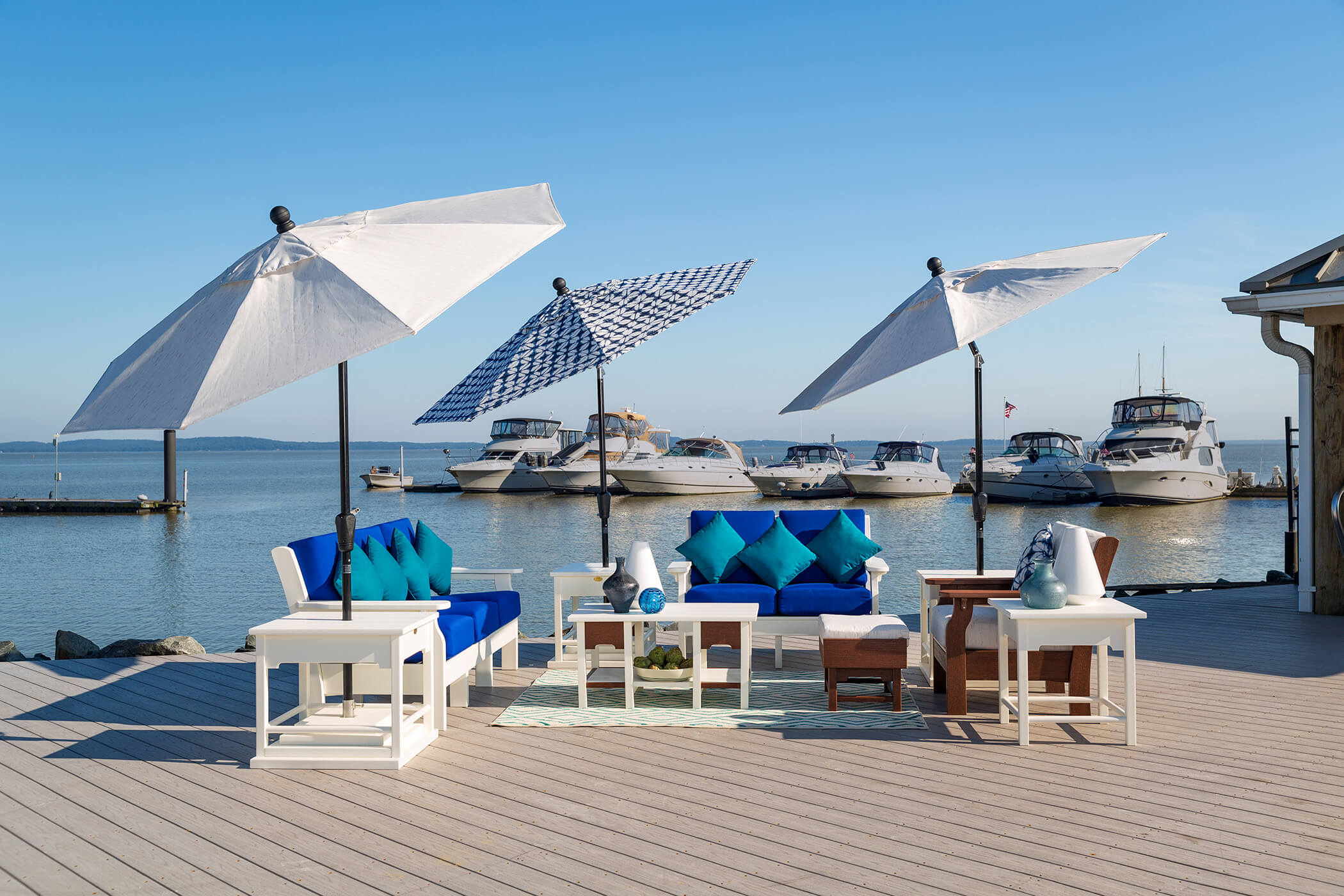 Deep seating love seat Deep seating love seats with umbrellas.