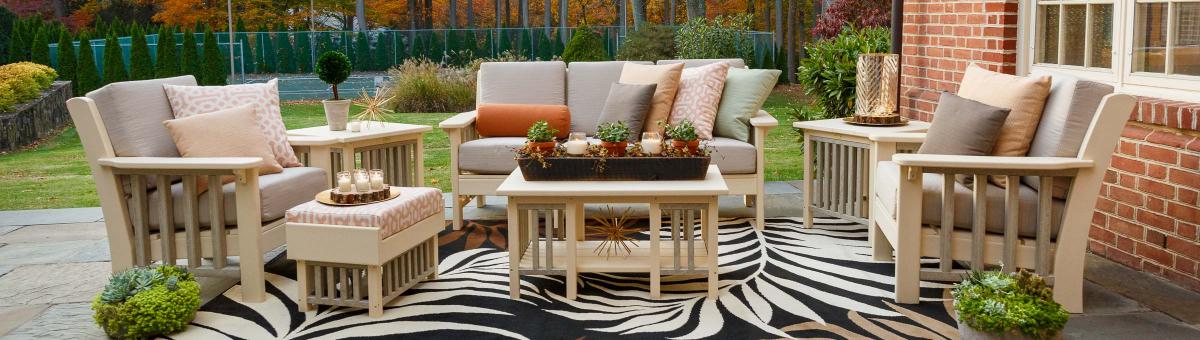 Finch outdoor furniture Finch deep seating collection with couch, two chairs, and coffee table.