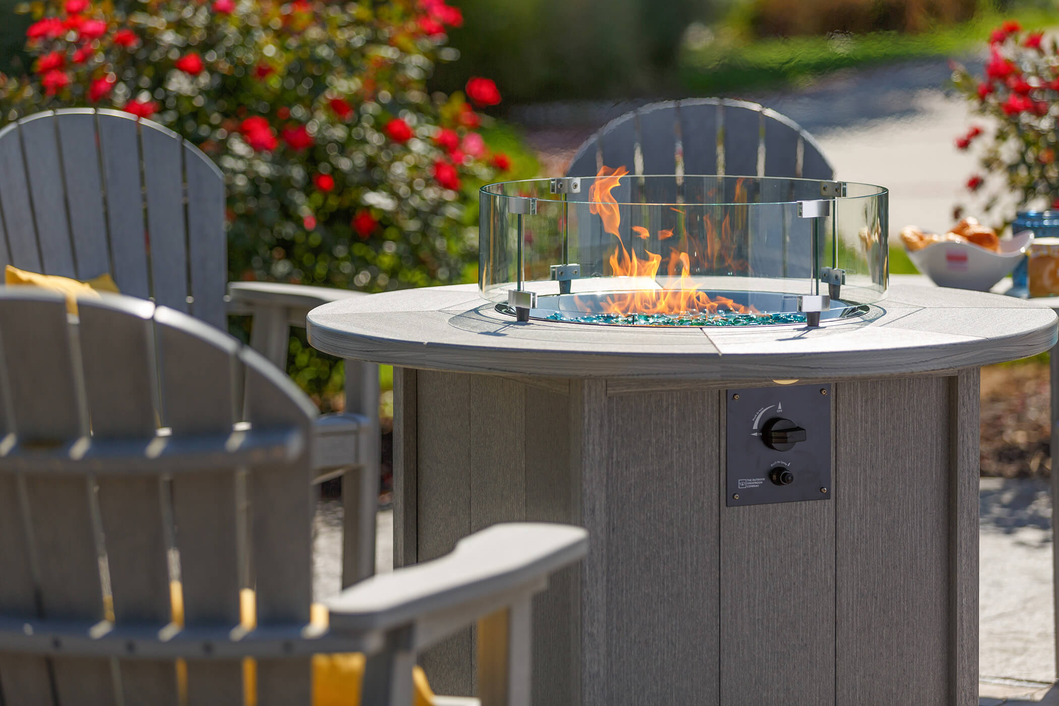 Fire table Fire table with Adirondack chairs.